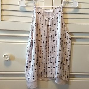 Lush cream colored tank. Flowy fit, high neck, has lining for extra coverage.